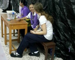 The ticket sales booth in front of the space we were using for the ghost house. You can see me, my homeroom teacher, and the teacher I think has been subbing for my homeroom teacher, in order from right to left.